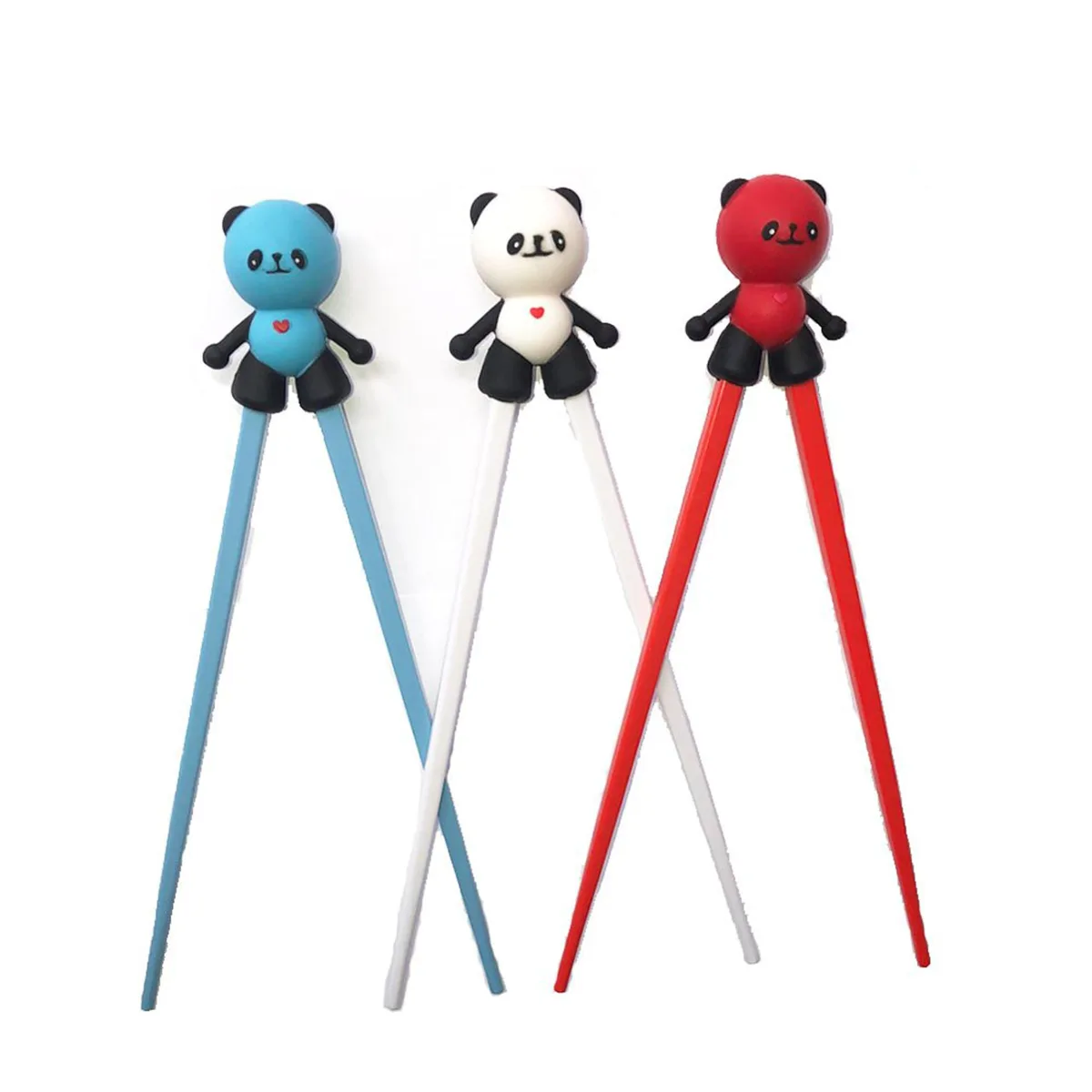 Three black panda-topped training chopsticks with removable silicone rings lying flat