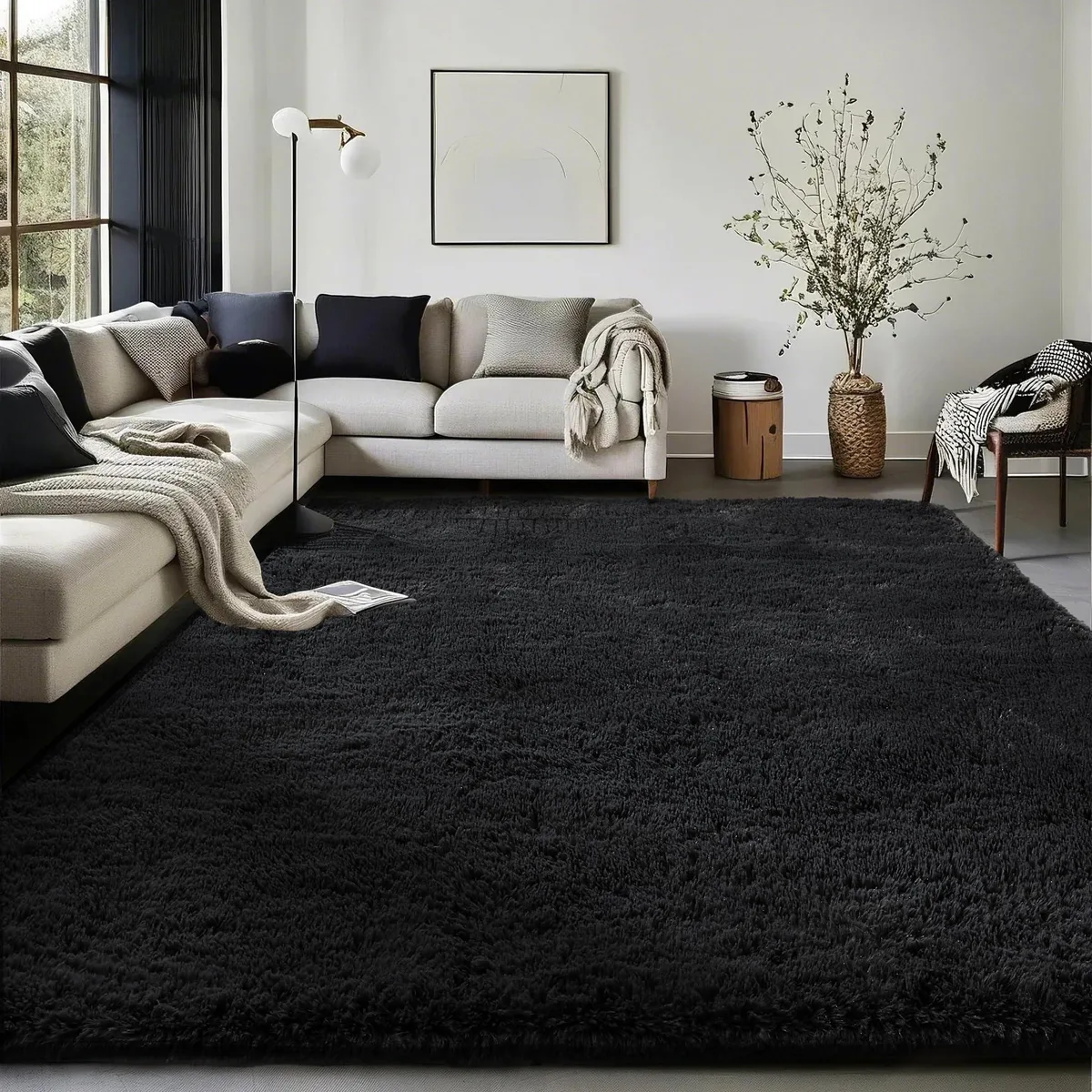 Rectangular black shag rug with high pile and non-slip backing