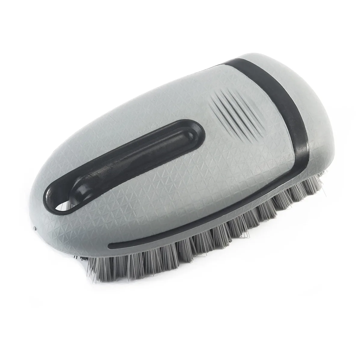 Gray rectangular carpet brush with stiff bristles and ergonomic rubber handle