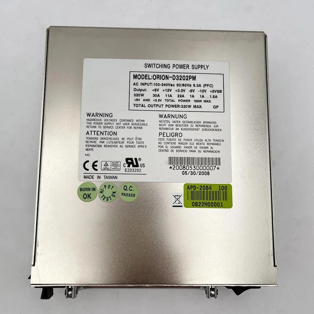 Silver rectangular ATX power supply unit with fan grille and label