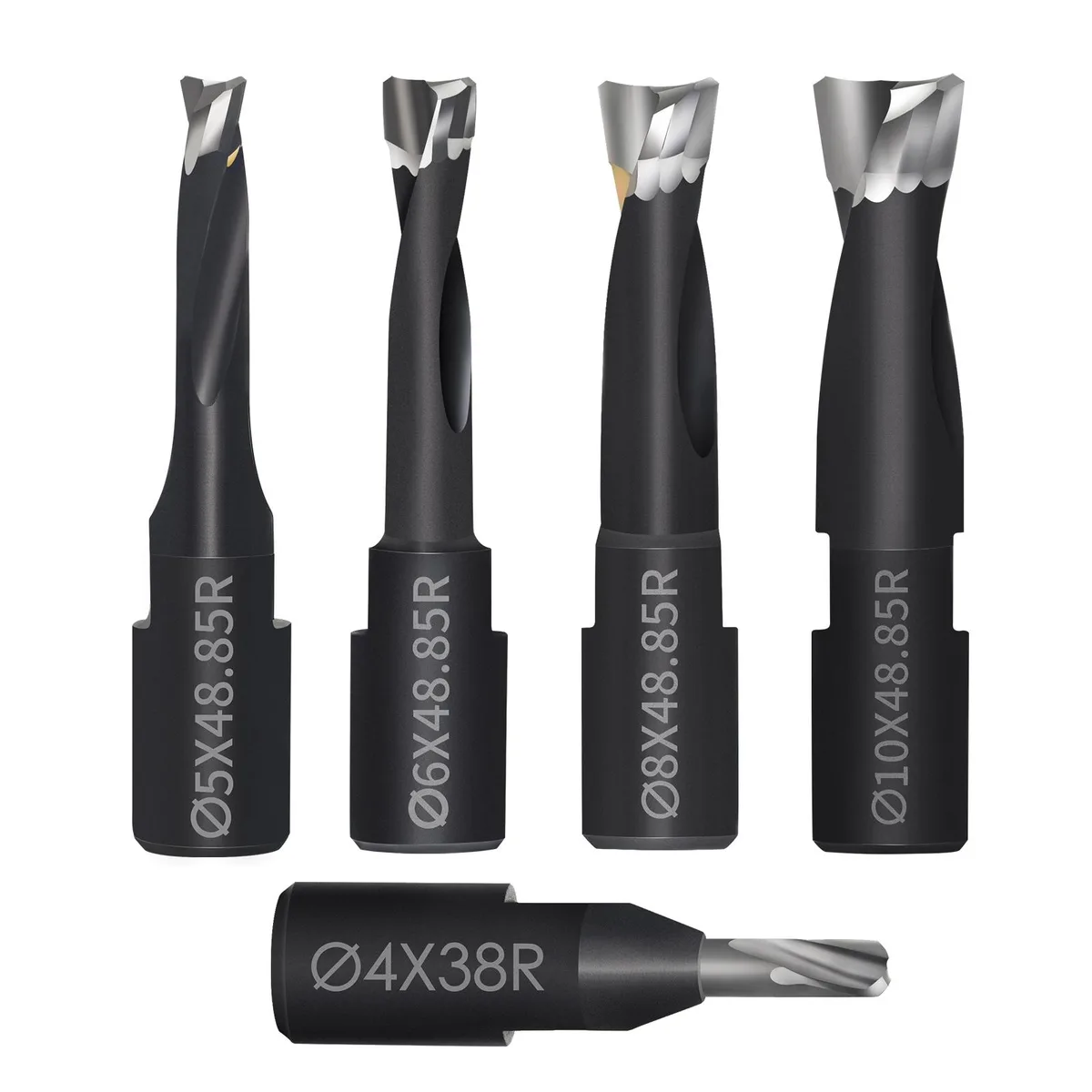 Five black PTFE-coated carbide domino bits in a compact case