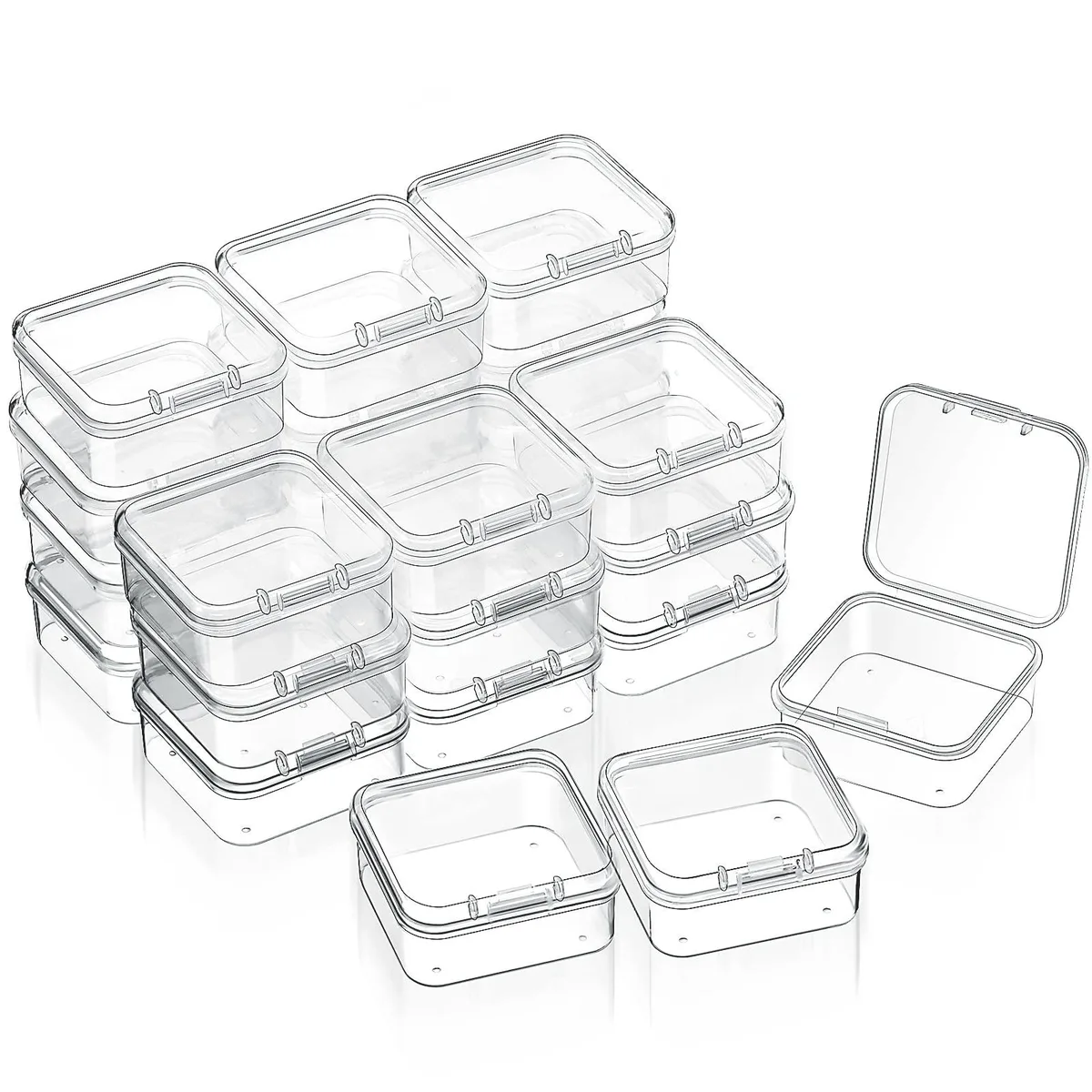 Twenty-four small clear rectangular plastic boxes with hinged lids, each 1.7 by 1.7 by .8 inches
