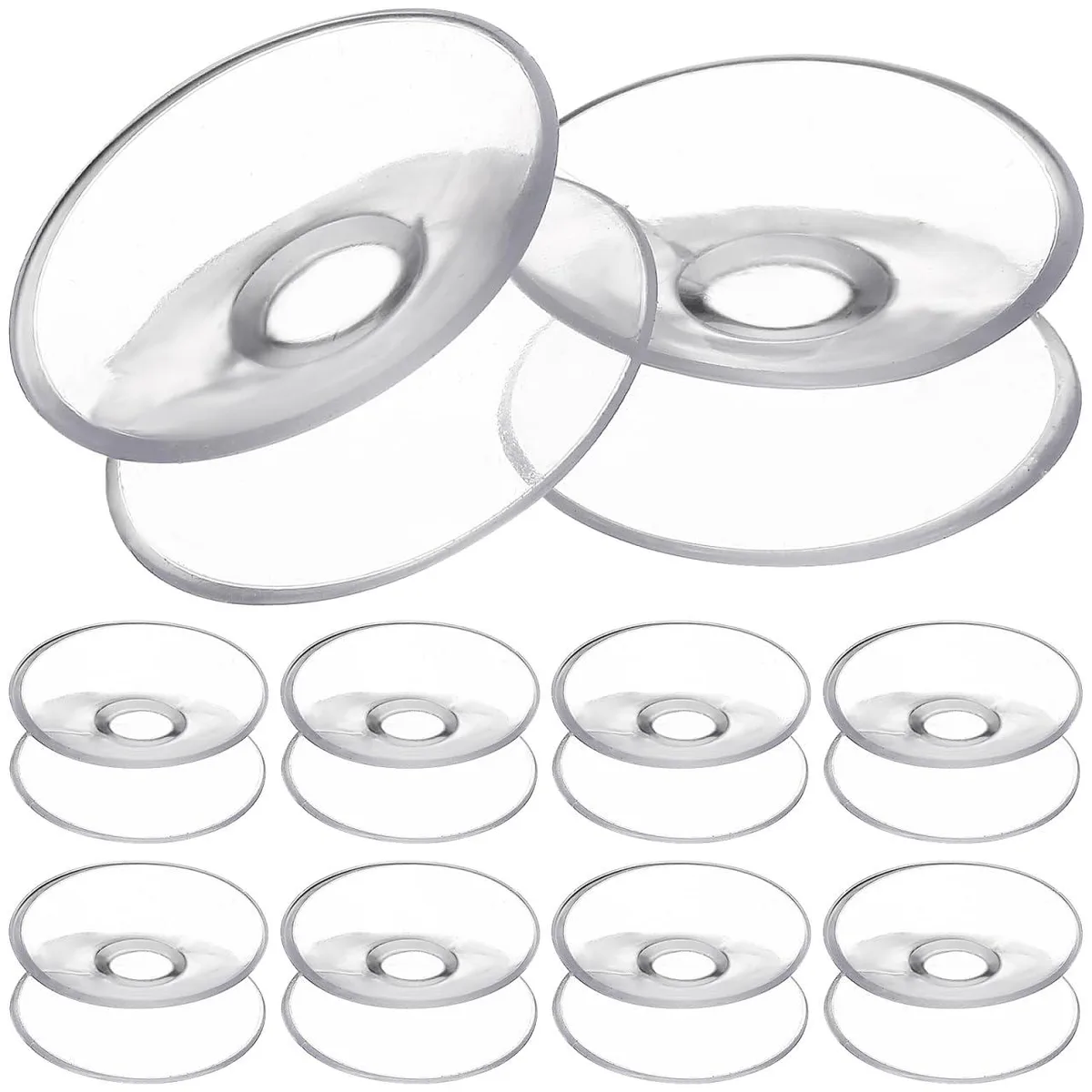 Ten clear 30mm double-sided suction cups on a surface