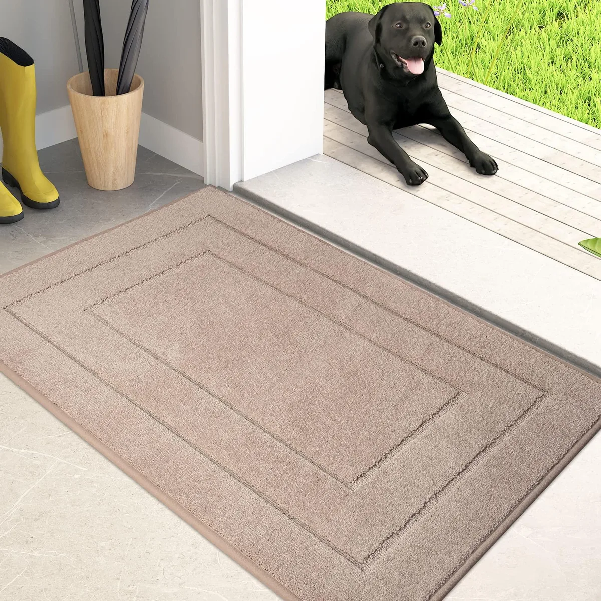 Rectangular beige door mat with geometric pattern, low-profile pile and reinforced edges