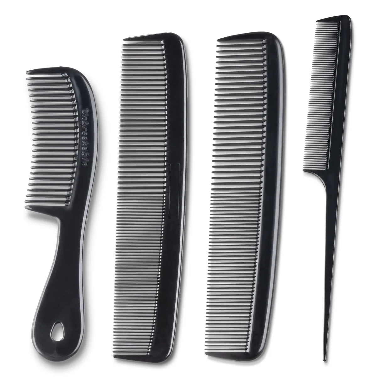 Four black plastic combs in different lengths and tooth styles, lying flat