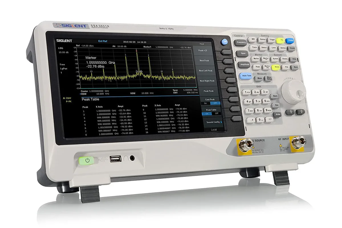 Benchtop spectrum analyzer in dark grey casing with front panel controls and display