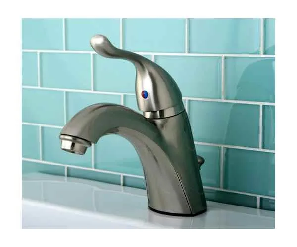 Brushed nickel single-handle bathroom faucet with 5.38 in spout and matching drain