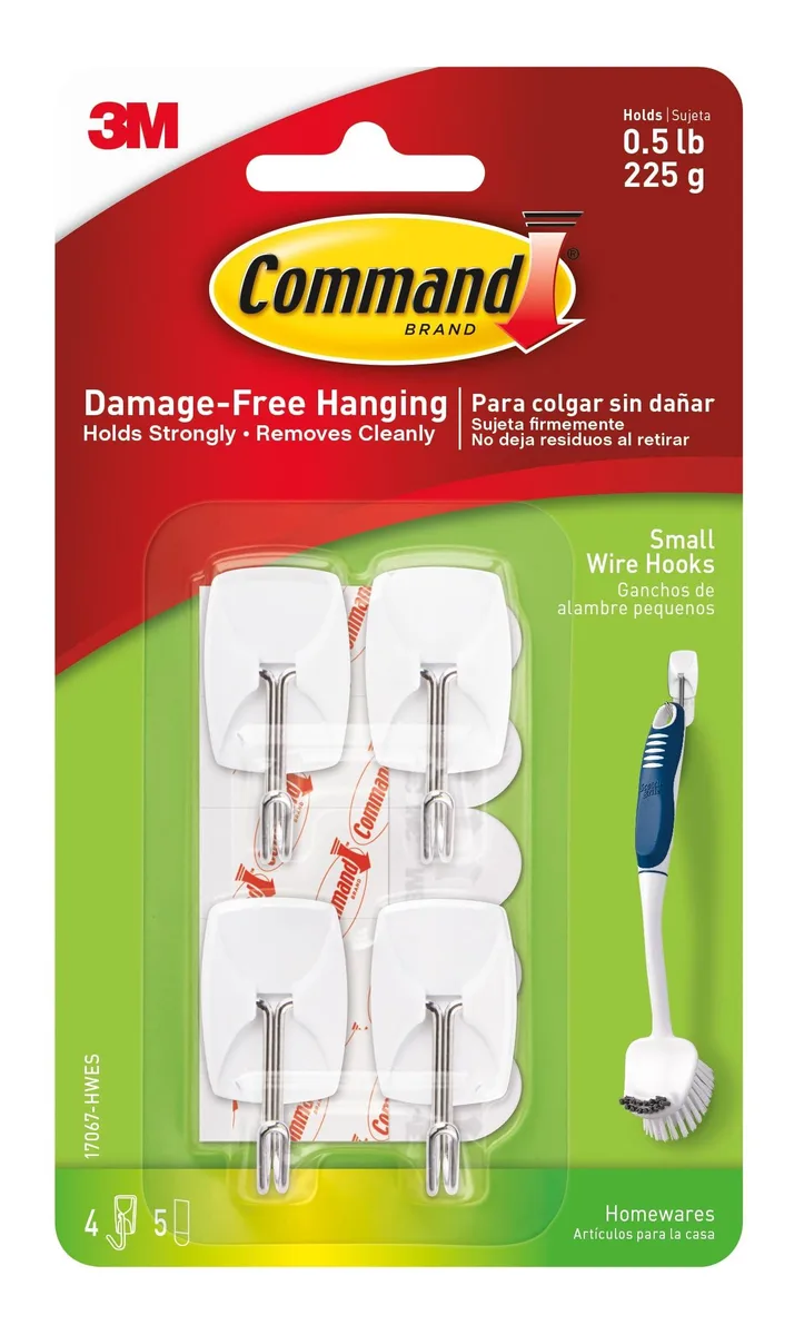 Four small white wire hooks with five adhesive strips