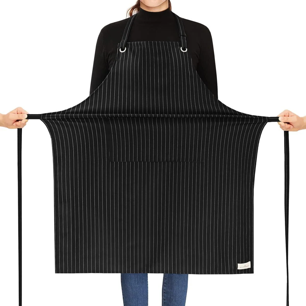 Black striped bib apron with two front pockets, adjustable neck strap and long waist ties