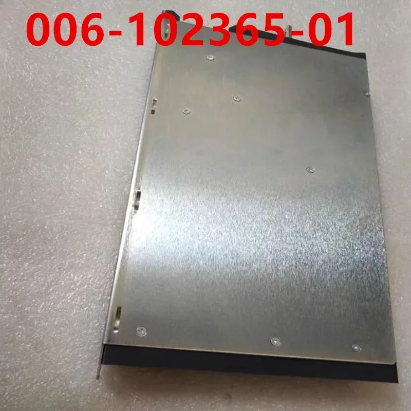 Rectangular ATX power supply unit with matte black metal casing and cooling fan grille