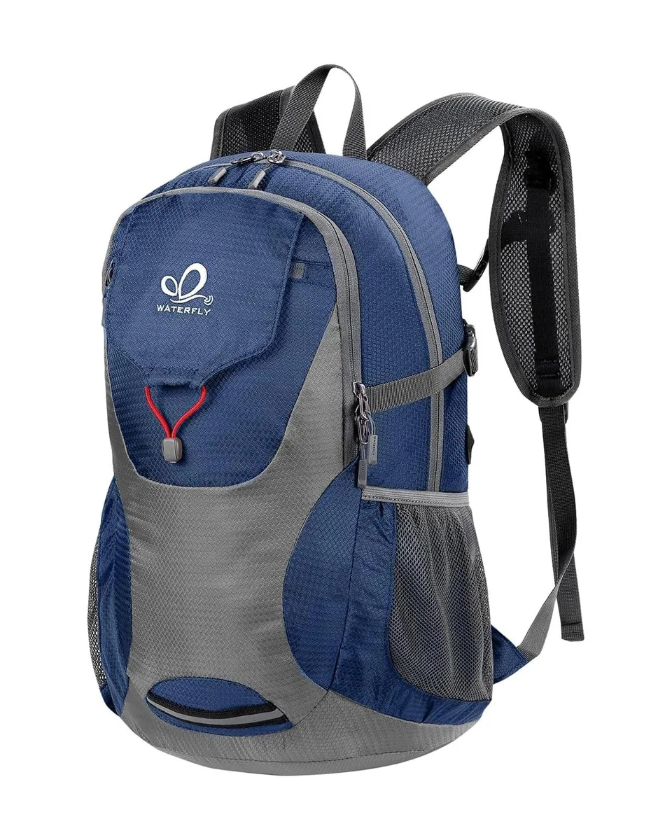 Blue packable nylon backpack folded into small pocket