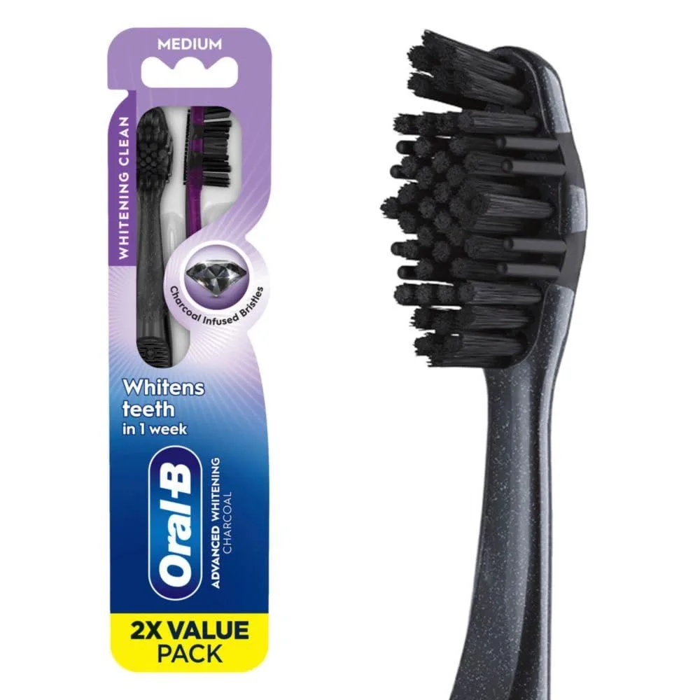 Two charcoal manual toothbrushes medium bristles