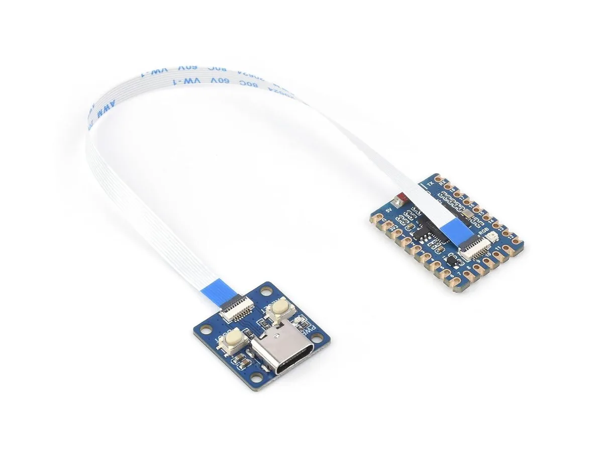 Small green circuit board with dual-row pin headers and separate USB-C adapter board