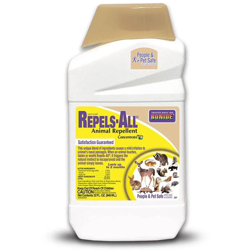 White plastic bottle labelled Repels-All Animal Repellent 32 oz Concentrate