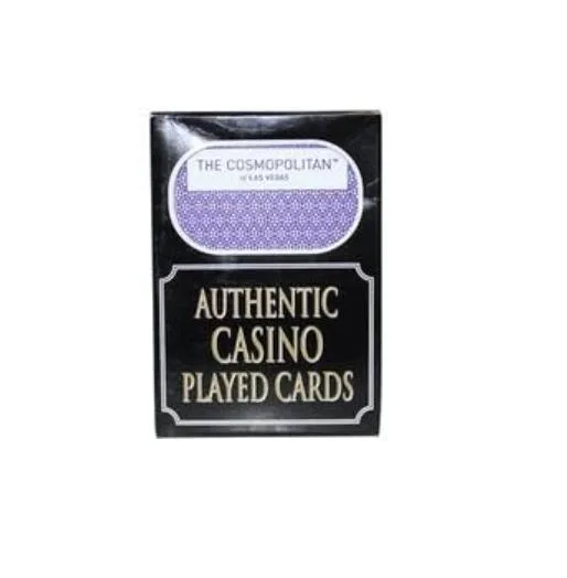 Two sealed packs of casino-used playing cards with clipped corners