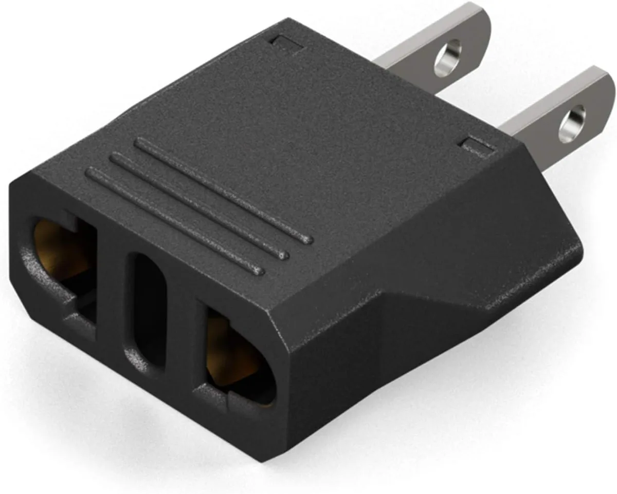 Black EU-to-US plug adapter, compact rectangular shape, 2.75 by 1.5 by .5 inches