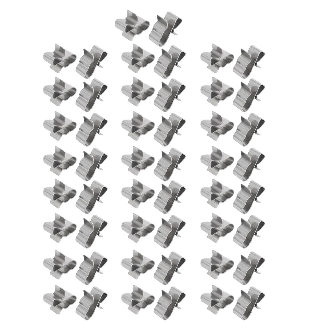 Fifty small silver stainless steel cable clamps arranged together
