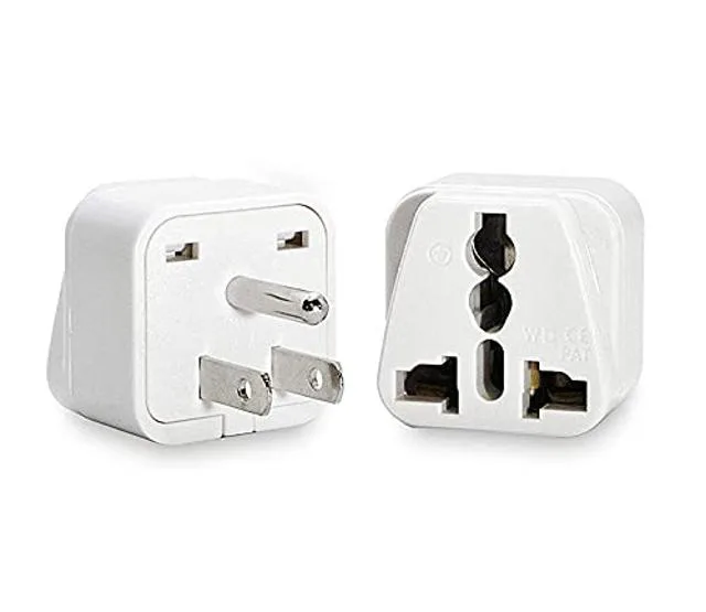 Two compact white travel plug adapters, each 27g, with US three-prong outlets and universal input sockets
