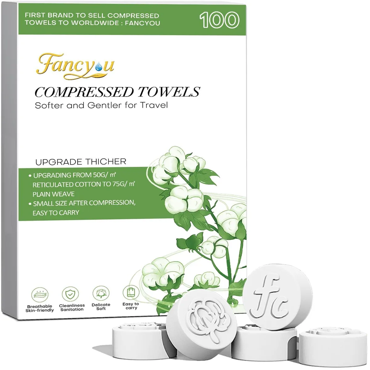 100 white compressed cotton towels in a rectangular pack