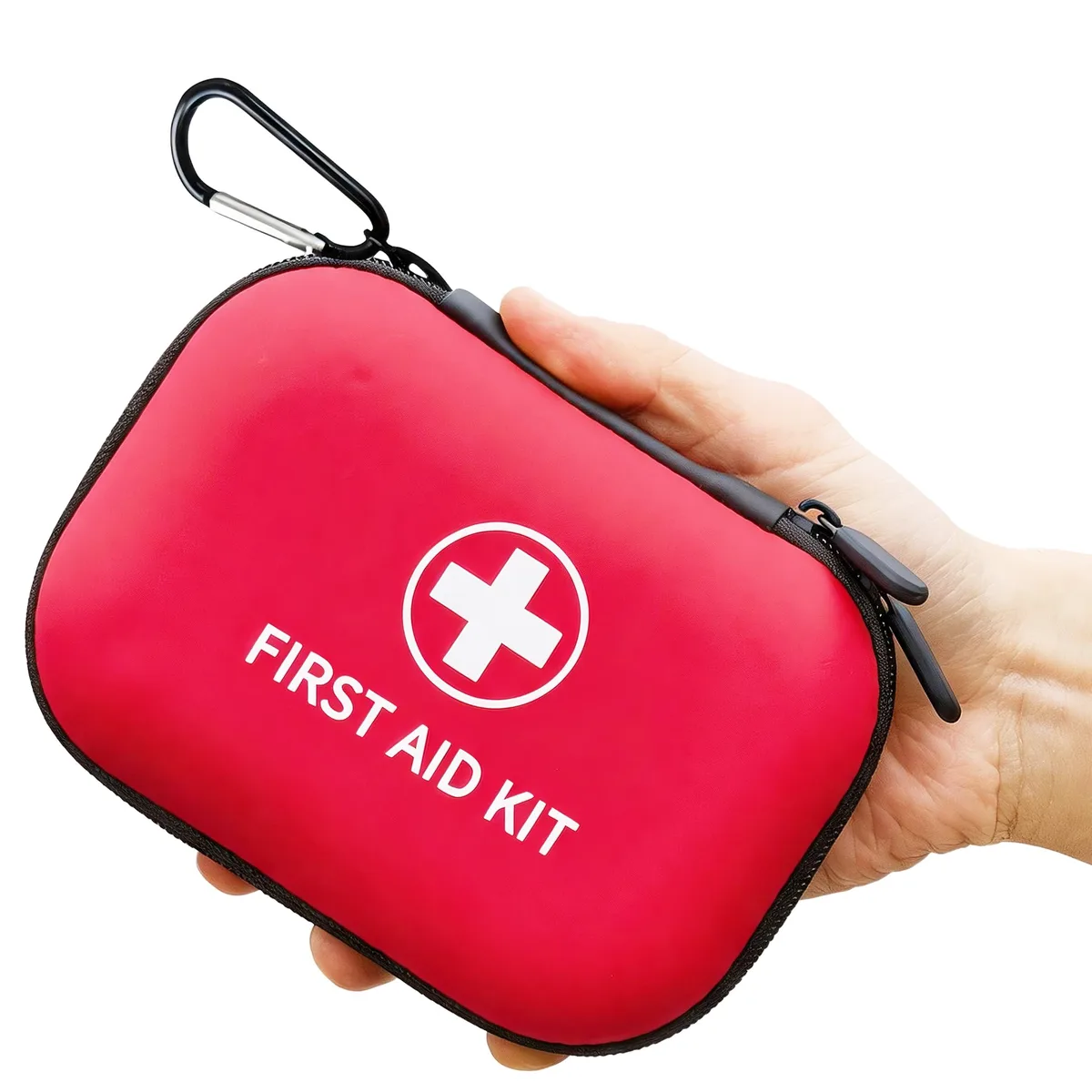Red compact first aid kit in hard case, 138 pieces, TSA approved