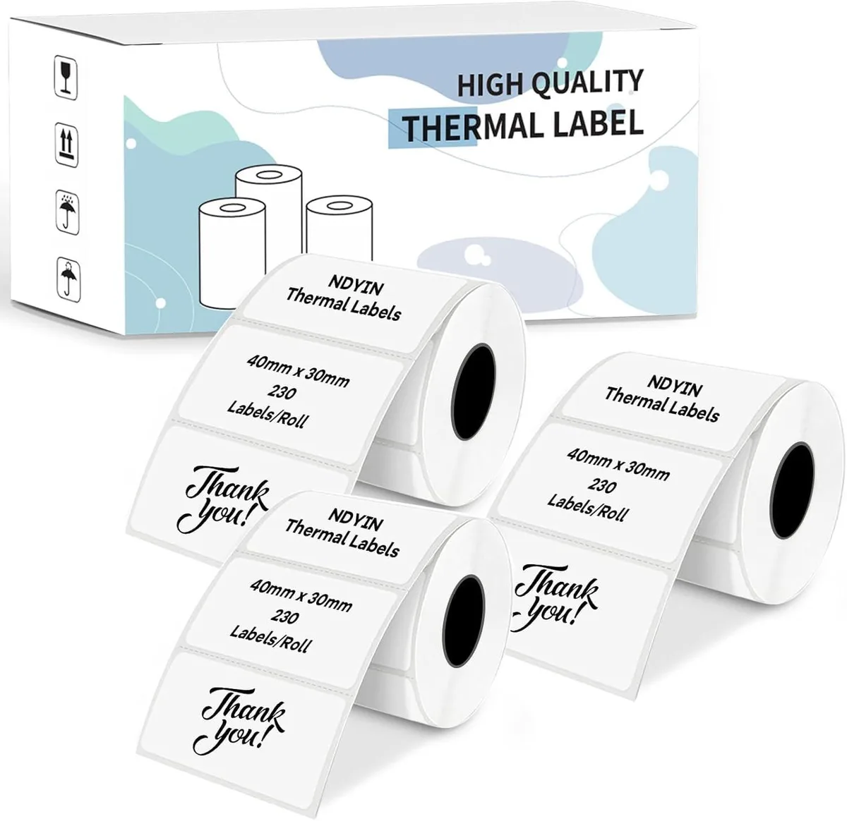 Three rolls of white glossy thermal labels on spools