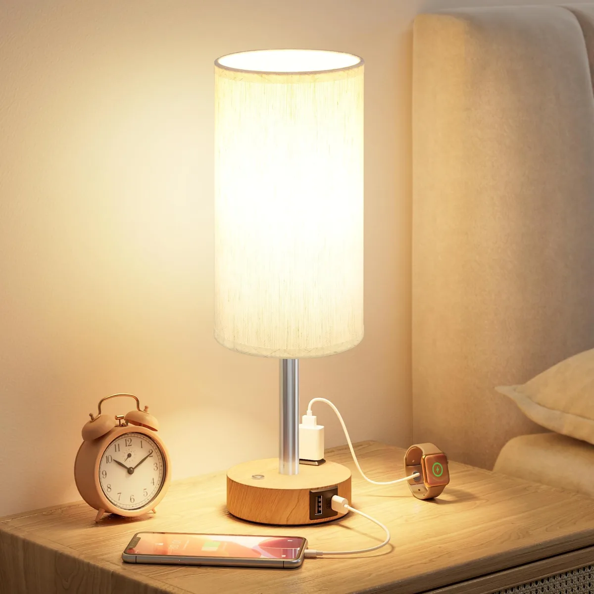 Compact round table lamp with fabric shade and plastic base, 14 inches tall, includes USB and AC charging ports
