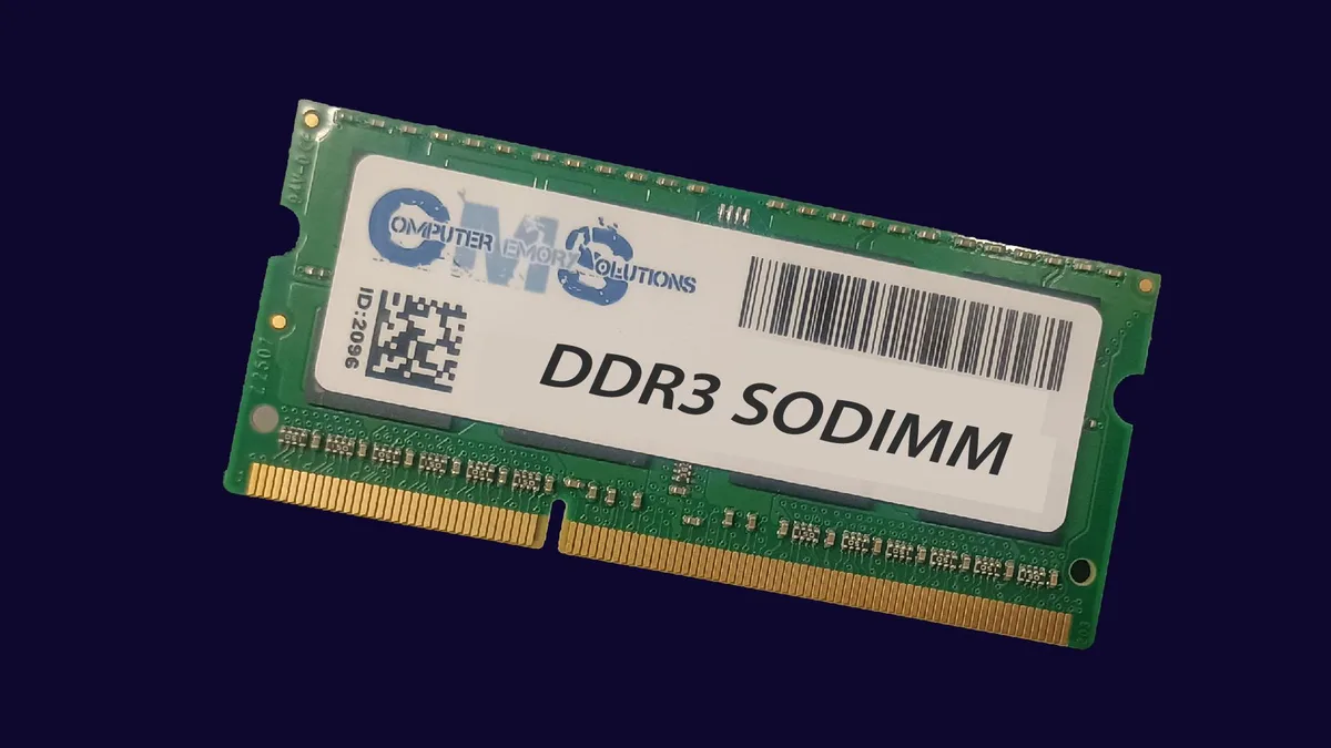 Two green DDR3 DIMMs with gold contacts and black chips