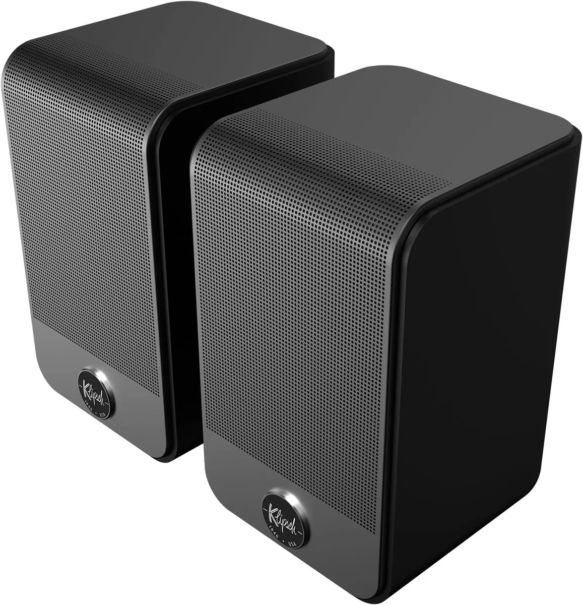 Two compact black wireless surround speakers with hidden controls and wall-mount design