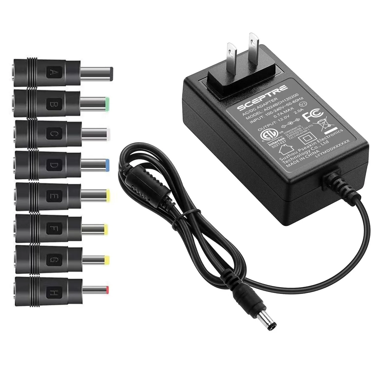 Black rectangular power adapter with 5.5x2.1mm barrel connector and eight interchangeable tips