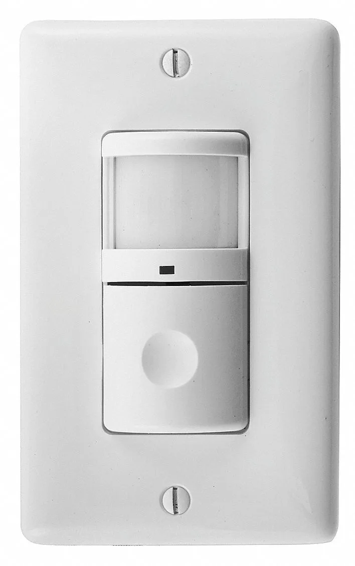 White wall-mounted occupancy vacancy sensor with single button and PIR lens