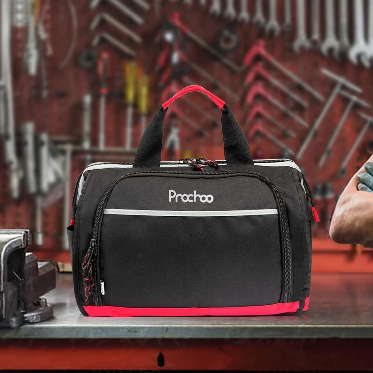 Black and red 16 inch tool tote with 25 pockets and adjustable shoulder strap