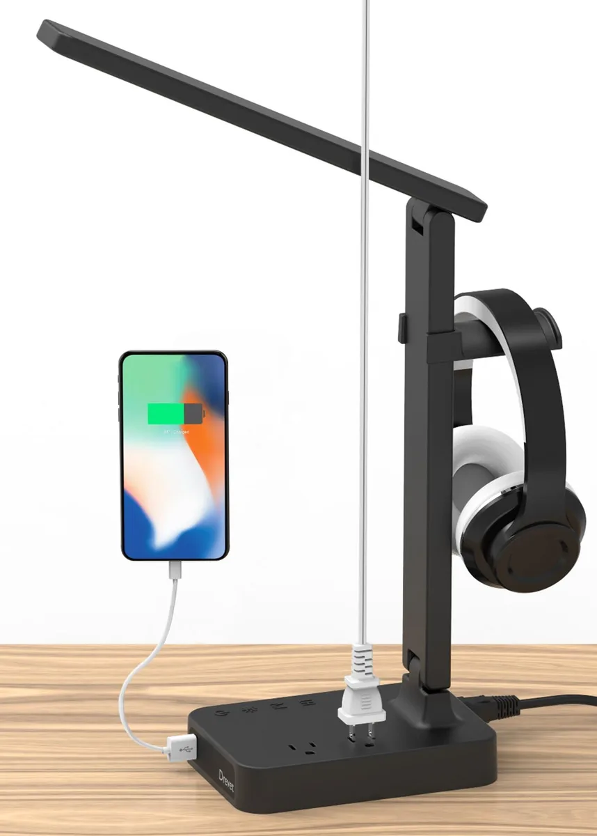 Rectangular desk lamp with smooth finish, headphone hanger, USB port, two AC outlets, foldable arm