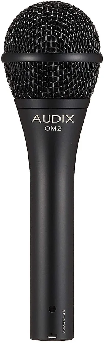 Silver cylindrical dynamic vocal microphone with black mesh grille