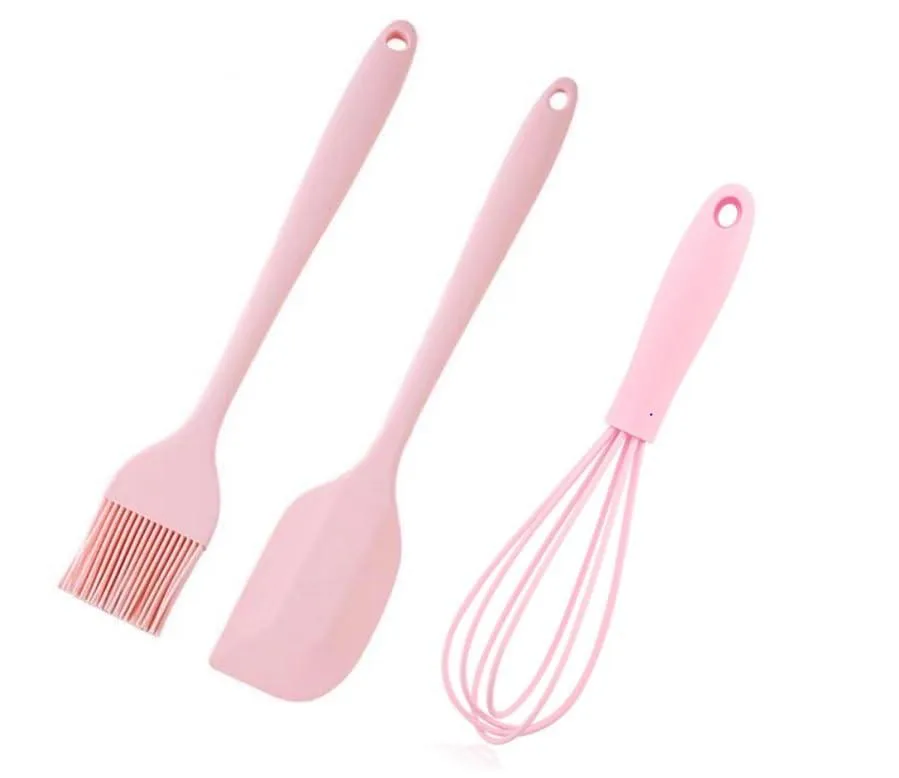 Two pink silicone basting brushes with long handles