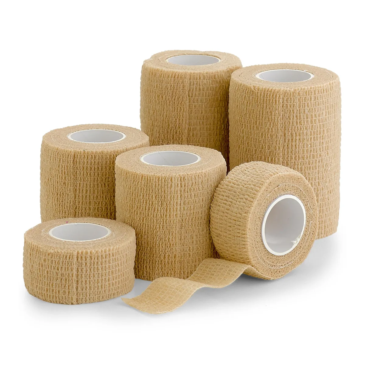 Six rolls of light tan self-adherent cohesive bandage in assorted widths