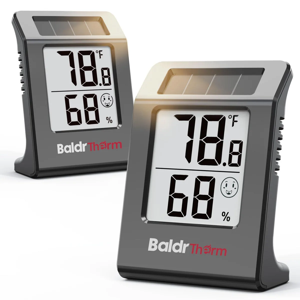 Two small black rectangular digital hygrometer thermometers with comfort indicator display