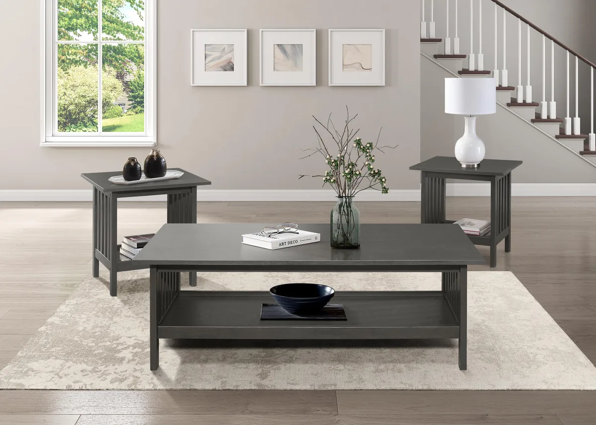 Three-piece occasional table set in antique gray wood finish with lower shelves