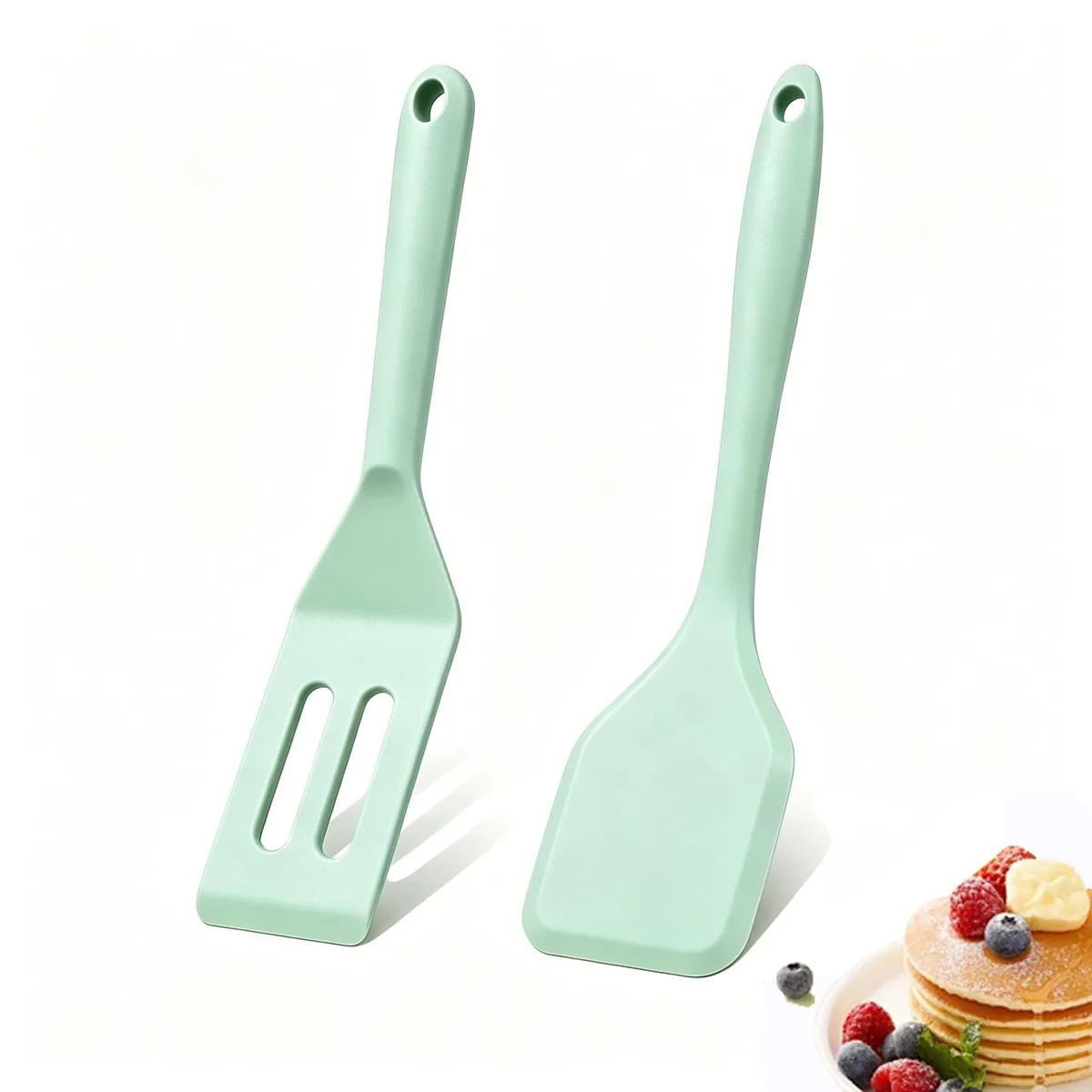 Two green mini silicone spatulas with rounded heads and hanging holes, 8.07 x 2.09 in and 8.07 x 1.65 in