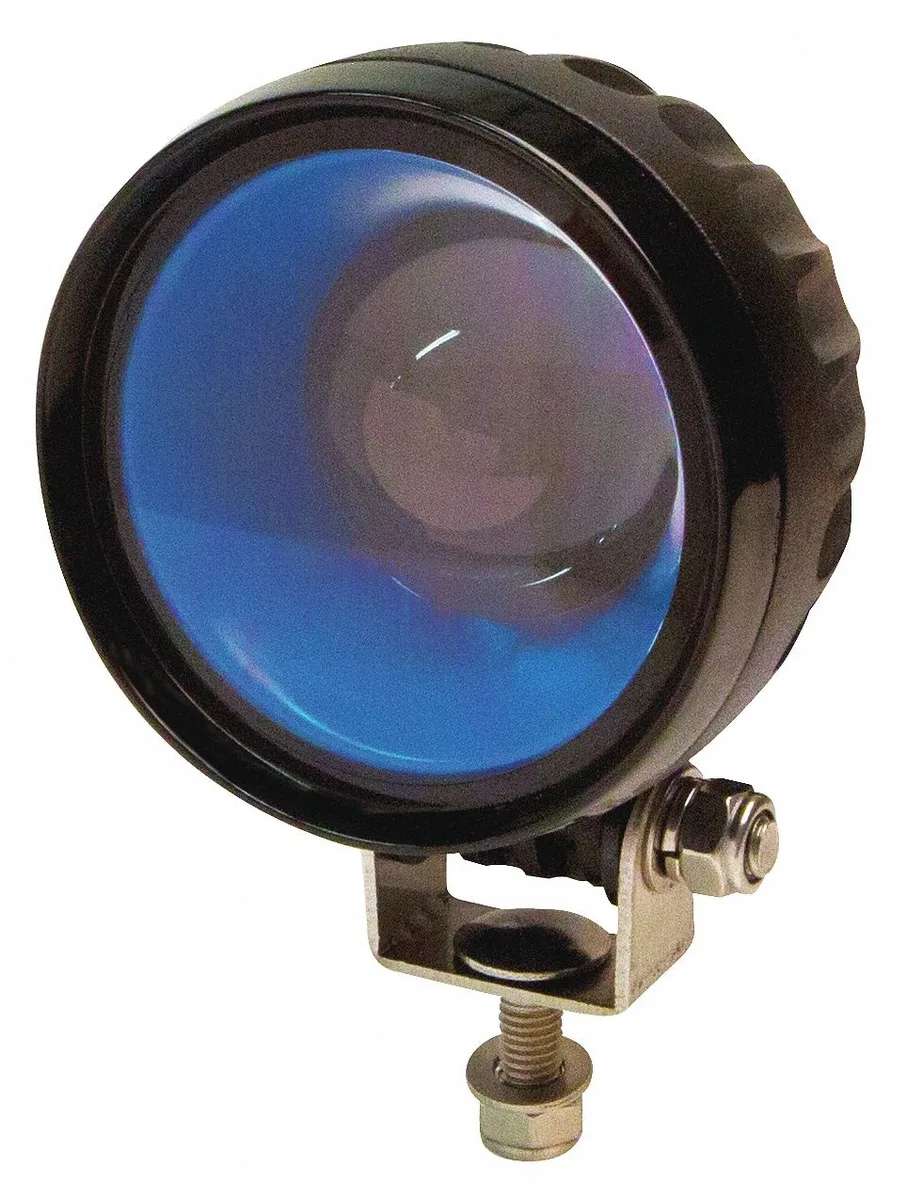 Black round LED spot light with clear lens projects blue arrow pattern IP67 rated