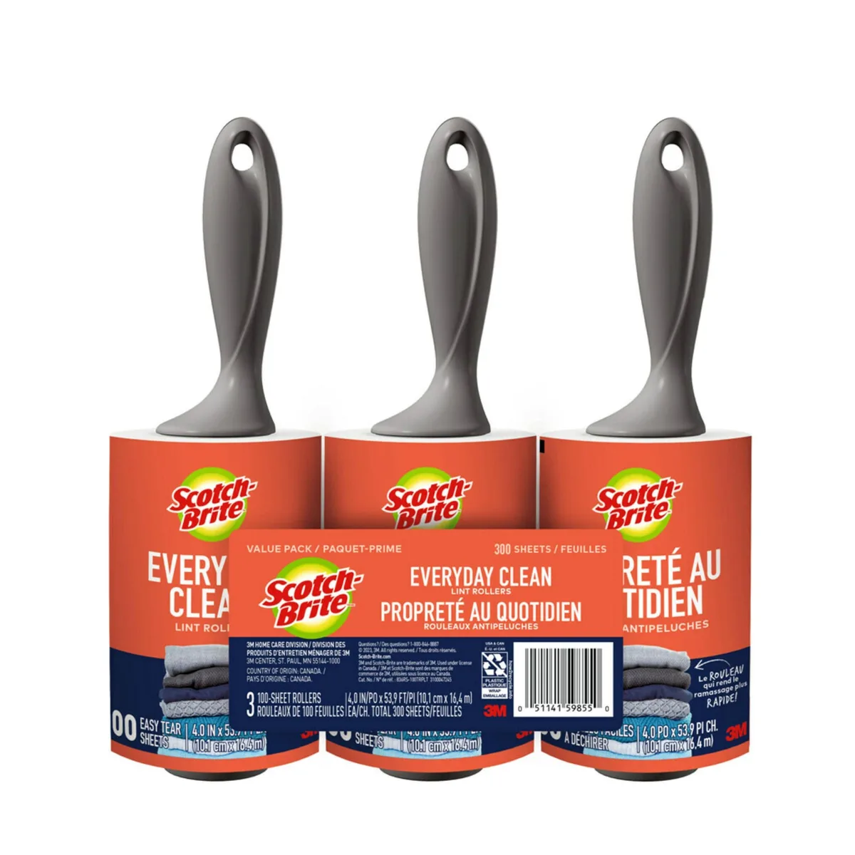 Three white plastic lint rollers with ergonomic handles and adhesive sheets