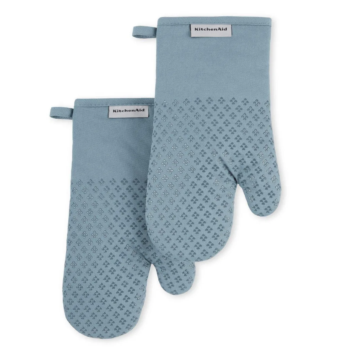 Two fog blue oven mitts with heart shaped silicone grips on cotton fabric