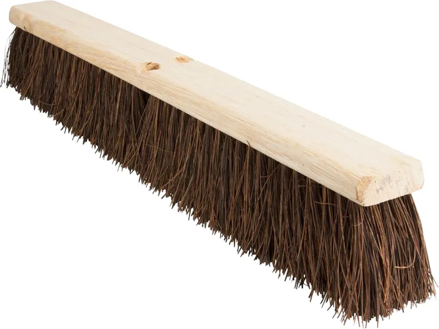 Brown 24 inch push broomhead with stiff Palmyra bristles on lacquered hardwood block