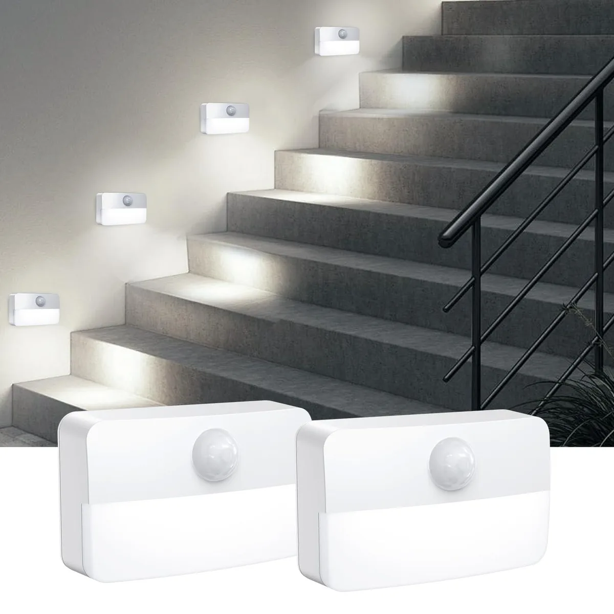 Two small white rectangular LED lights with adhesive backing