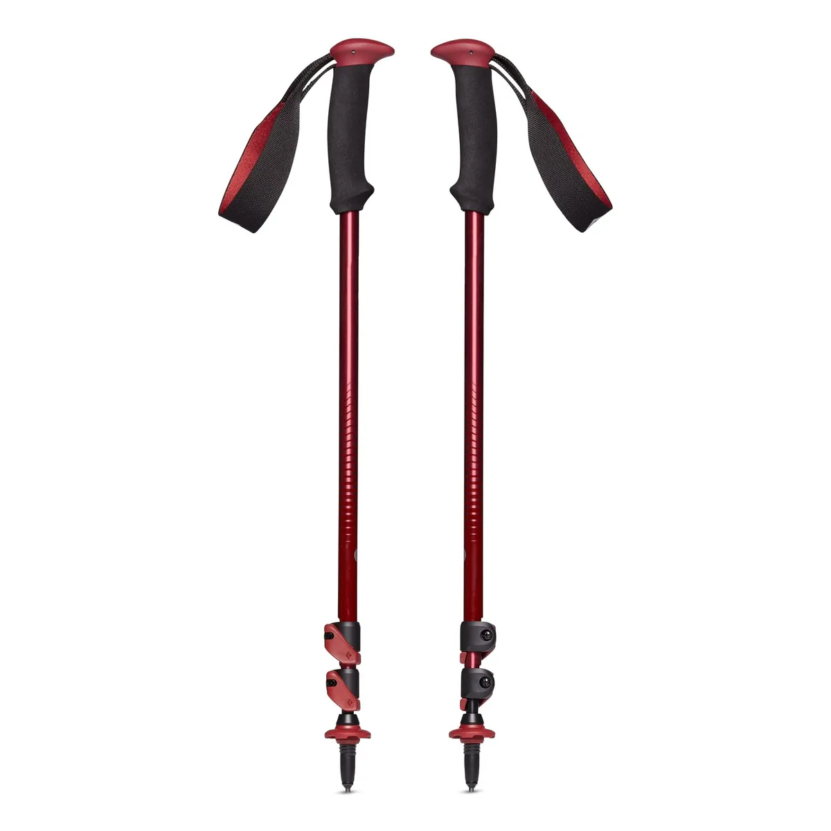 Pair of dark crimson aluminum trekking poles with foam grips and FlickLock adjustment