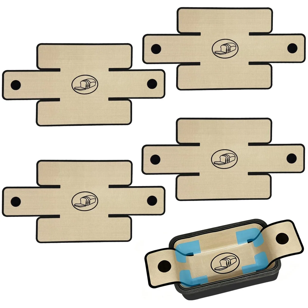 Four brown silicone loaf pan liners with extended handles lying flat