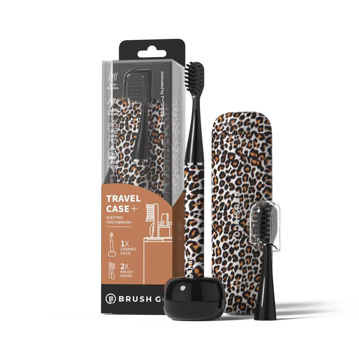 Slim white electric toothbrush with leopard-print travel case and ceramic dock