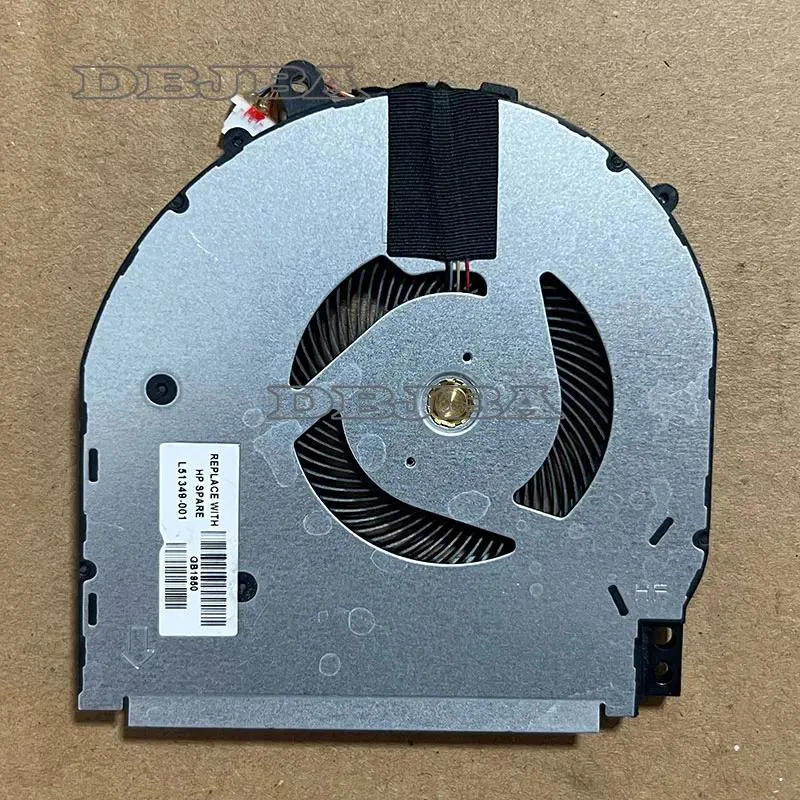 Small black laptop CPU cooling fan with plastic housing and cable connector