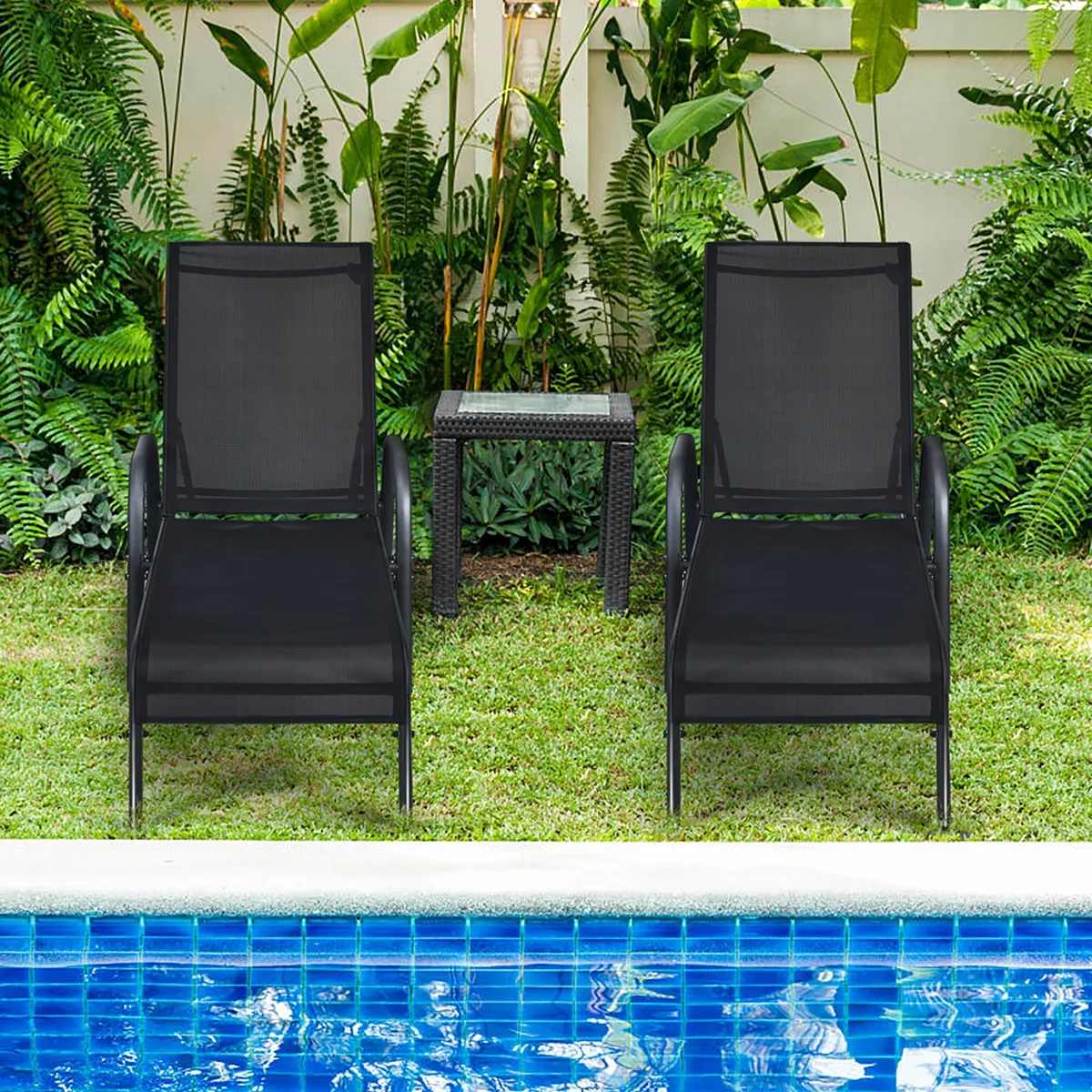 Two black outdoor lounge chairs with adjustable backrests and curved armrests