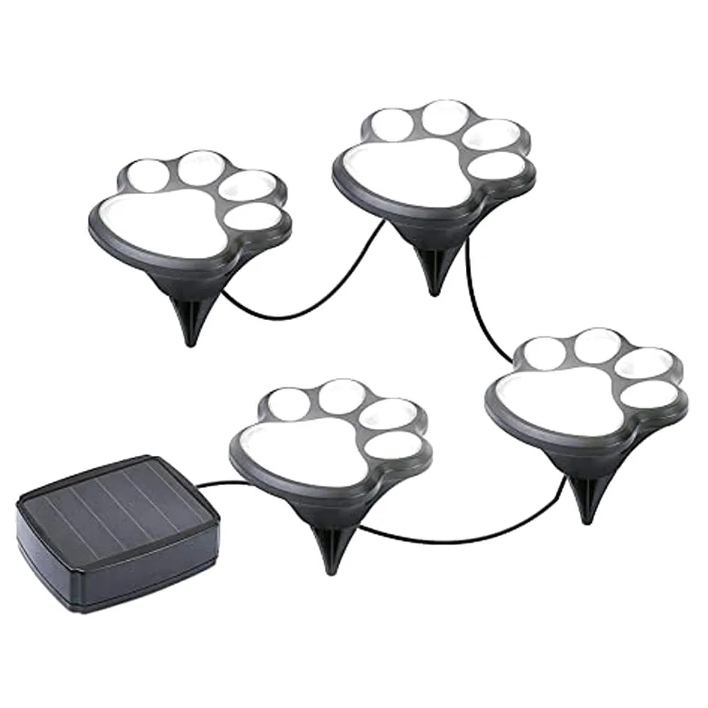 Four square solar paw-print lights on ground spikes