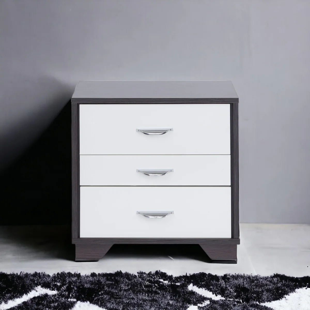 White and black rectangular night table with three drawers
